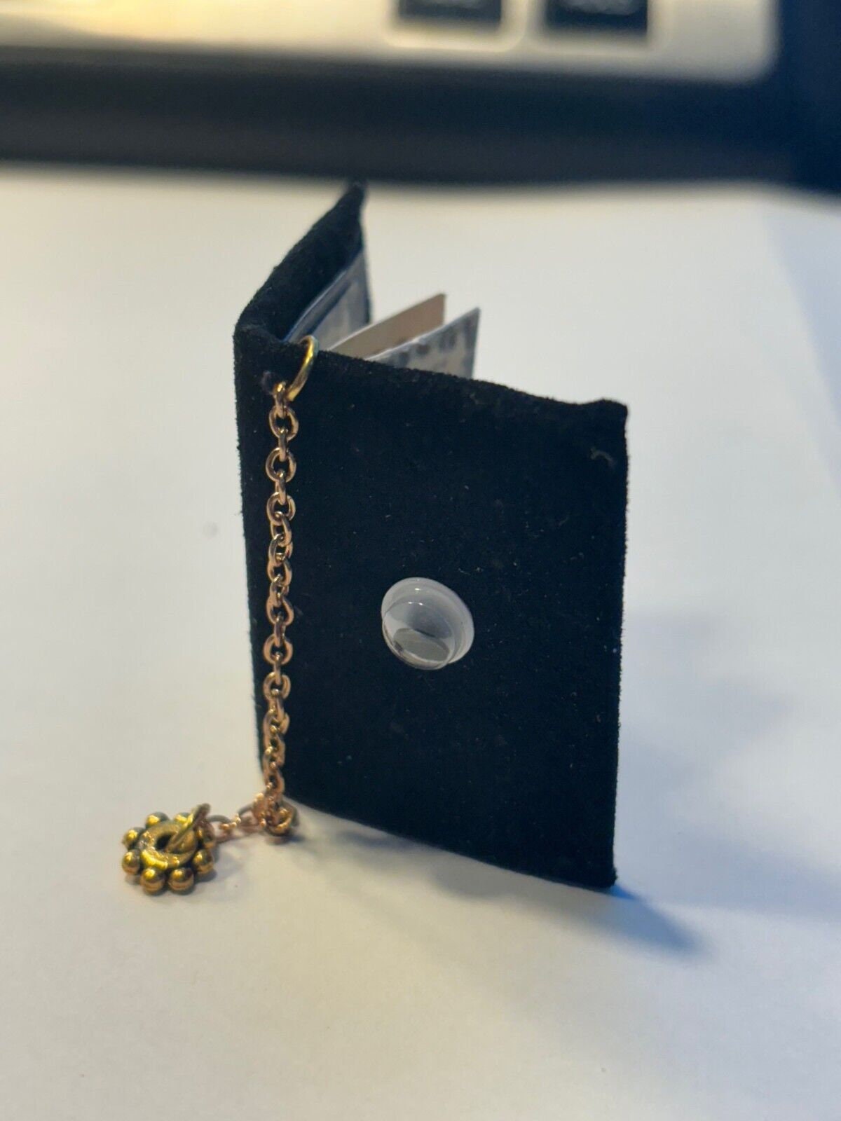 Dollhouse miniature eye book with real pages handcrafted by taylor jade