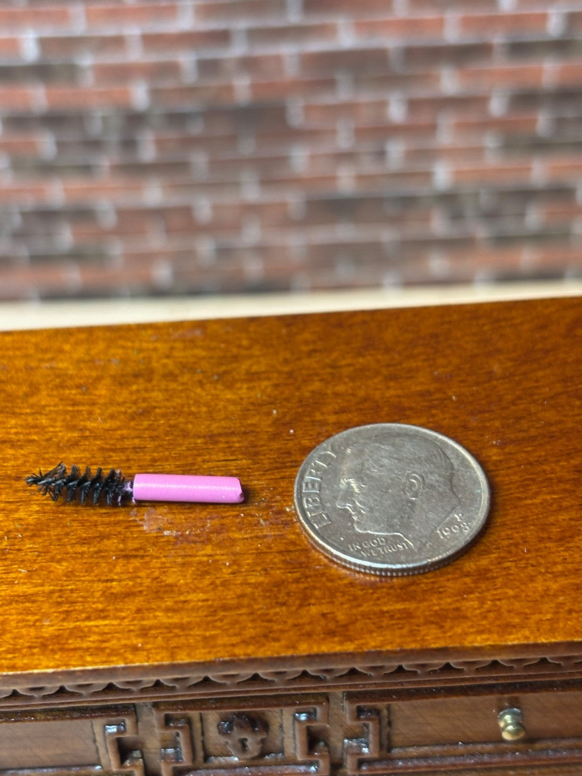 Dollhouse Miniature Black Styling Brush with Pink Handle by Delph Miniatures